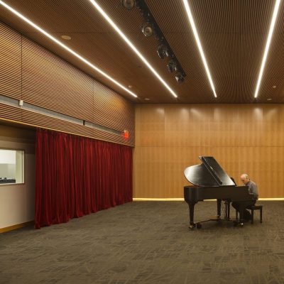 9Wood's 1100 Cross Piece Grill in Solid Western Hemlock with Stain at Alaska State Library, Archives and Museum, Juneau, Alaska. Hacker Architects. Photo: Lara Swimmer. The building features standard wood grille ceilings on single, horizontal elevations. Photo: Lara Swimmer.