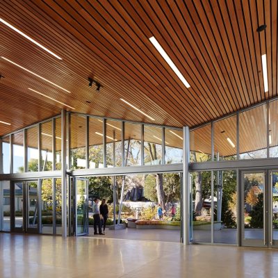 9Wood 2300 Continuous Linear exterior wood ceiling installation at Brookfield Zoo, Chicago, Illinois. Booth Hansen.