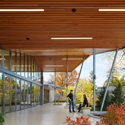 9Wood 2300 Continuous Linear exterior wood ceiling installation at Brookfield Zoo, Chicago, Illinois. Booth Hansen.