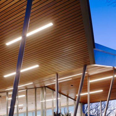 9Wood 2300 Continuous Linear exterior wood ceiling installation at Brookfield Zoo, Chicago, Illinois. Booth Hansen.