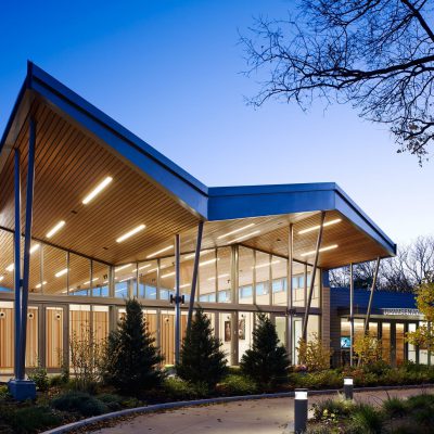 9Wood 2300 Continuous Linear exterior wood ceiling installation at Brookfield Zoo, Chicago, Illinois. Booth Hansen.