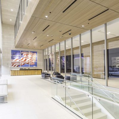 9Wood 1400 Dowel/Cross Piece Grille at Hillwood Offices at Turtle Creek, Dallas, Texas. Mithun; BOKA Powell. Photo: Irish Coffee Studio. The building features 1,055 wood grille panels that integrate with 106 can lights, 46 slot diffusers, 76 fire sprinklers, 10 fire alarms, and 4 cameras.