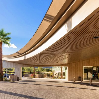 Exterior wood ceilings can make a bold welcoming statement for your project. This exterior linear wood is stained hemlock carefully sealed for exterior environments..