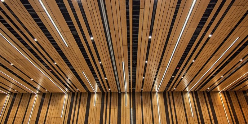 9Wood's 2100 Panelized Linear at the Hyatt Regency Seattle in Seattle, Washington. LMN Architects. 9Wood made optimal use of material, using off-cuts from one end of the system efficiently at the other so as to minimize waste and maximize yield.