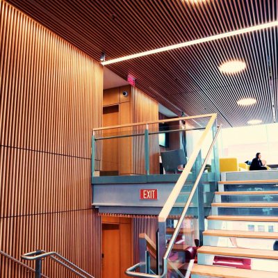 9Wood's 1100 Cross Piece Grille in FSC certified Solid European Beech with Clear Finish at The Smith Campus Center, Harvard University, Cambridge, Massachusetts. Hopkins Architects and Bruner/Cott Architects. The 18,075 sq. ft. of wood grille ceilings were suspended on multiple levels and needed to match precisely the grille wall systems installed by a separate millwork contractor.