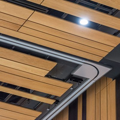 9Wood's 2100 Panelized Linear at the Hyatt Regency Seattle in Seattle, Washington. LMN Architects. The installation involved integrations with lighting fixtures, air diffusers and more.