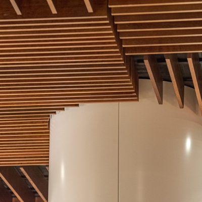 9Wood's 1100 Cross Piece Grille at the Hyatt Regency Seattle in Seattle, Washington. LMN Architects. The restaurant ceiling was laid out as dozens of separate floating clouds.