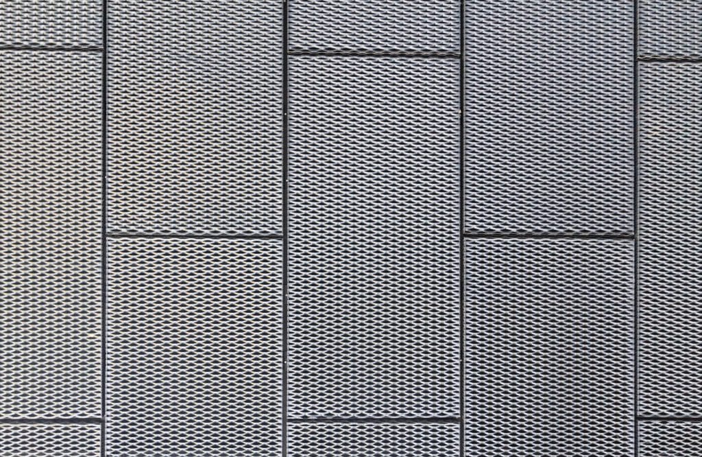 Perforated metal ceilings provide acoustical value, depending on percentage opening