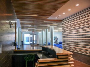http://The%209Wood%209100%20Hybrid%20Panel%20in%20Walnut%20and%20White%20Ash%20Veneer%20in%20a%20Ceiling%20and%20Wall%20application.