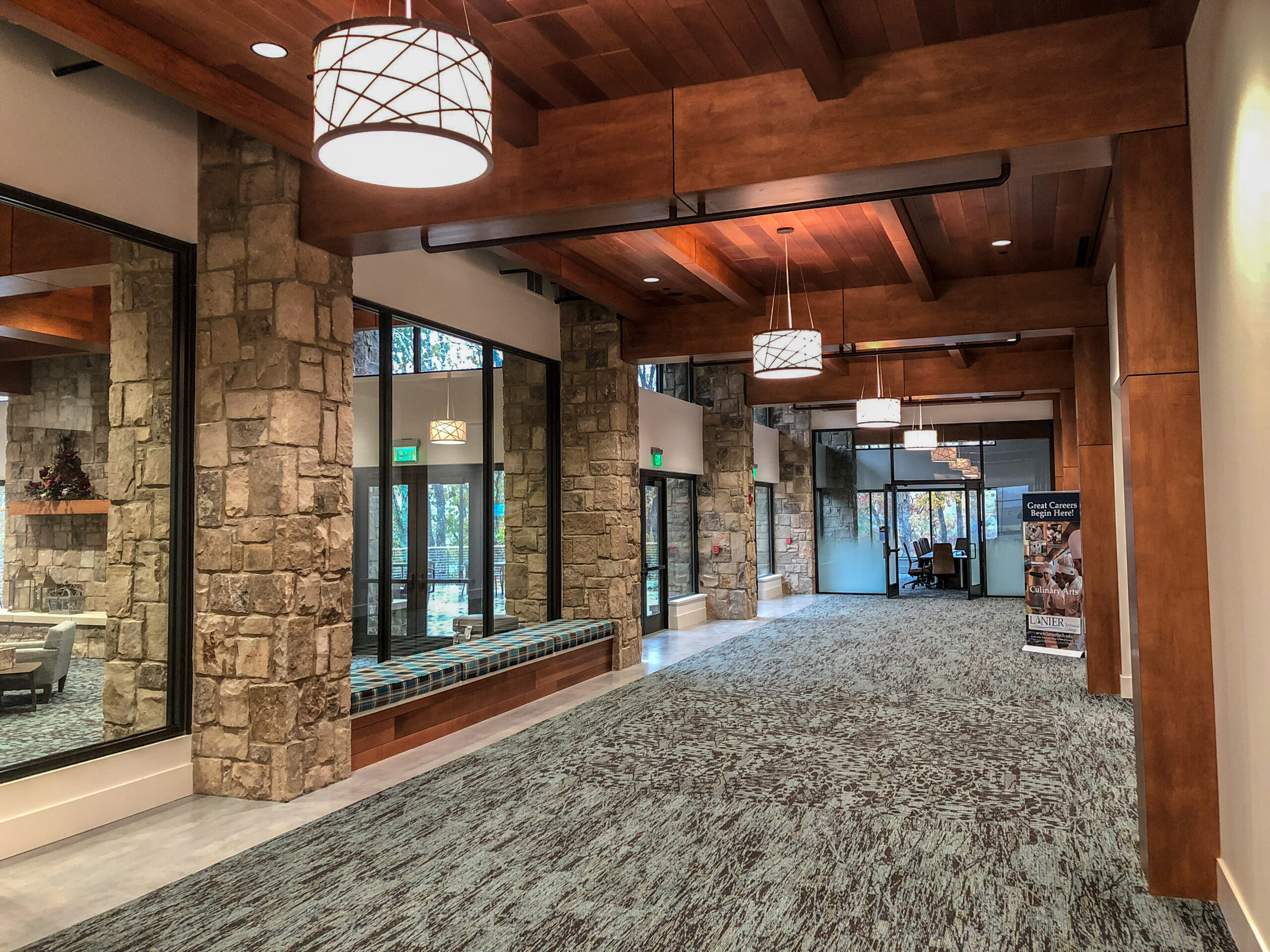 most beam ceilings that we appreciate have wood as a main feature. Often times wood grilles or linear wood will be used around a beam matched to the same finish color. 
