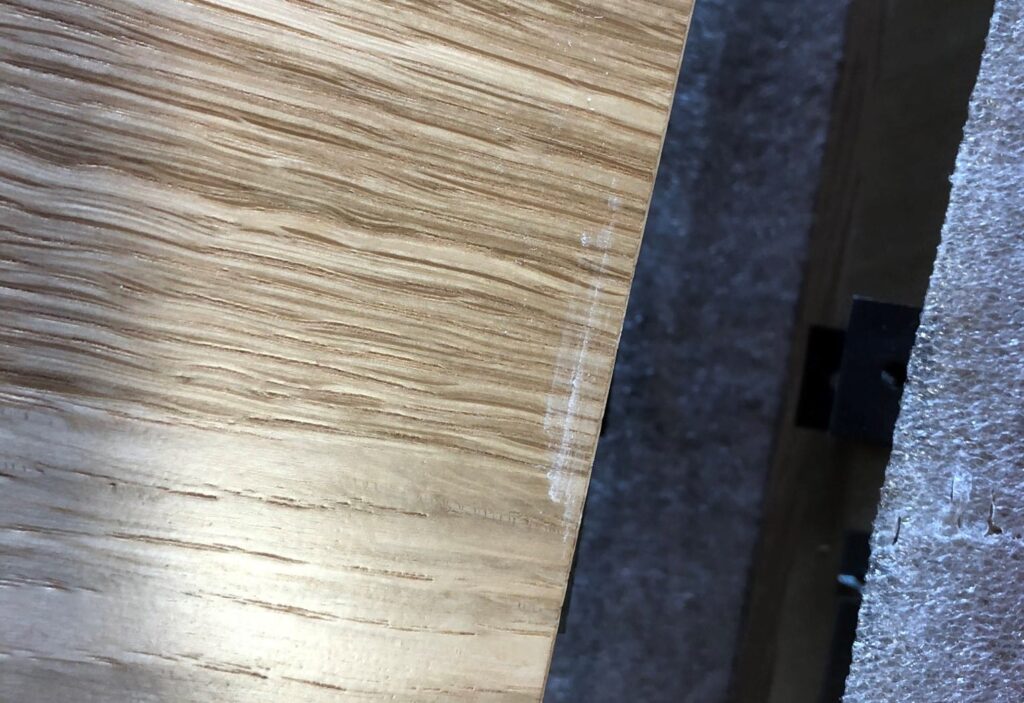 Scratches can appear on the face of tiles or other wood ceiling products during handling at the jobsite.