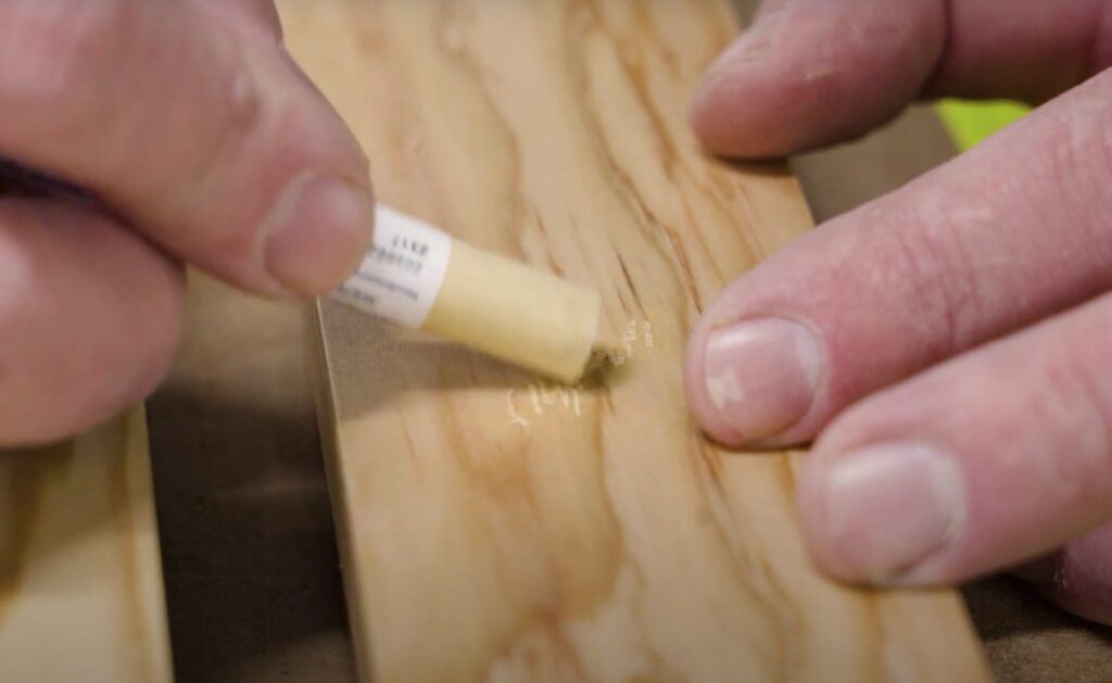 Using different colors, we can blend the grain on this surface damage repair.