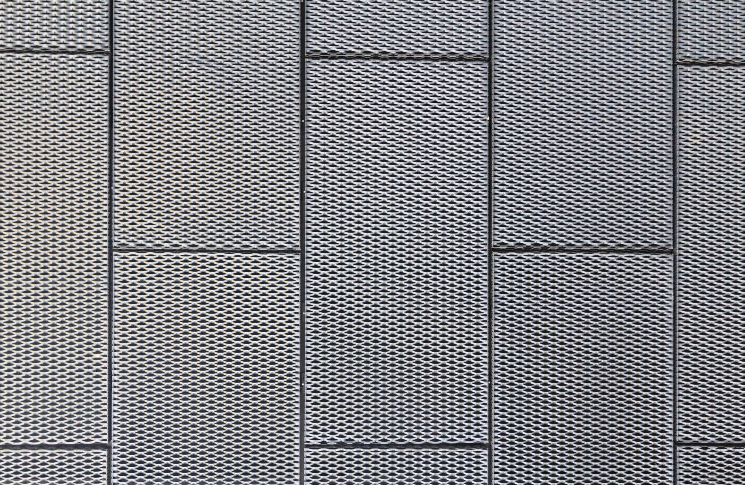 Perforated metal ceilings provide acoustical value, depending on percentage opening
