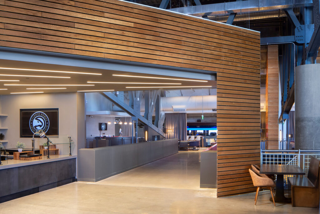 Medium stained linear wood wall at State Farm Arena by 9Wood