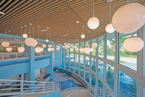 http://The%209Wood%201800%20True%20Access%20Grille%20Ceiling%20in%20White%20Maple%20Veneer%20in%20an%20education%20setting.