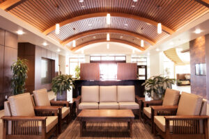 http://9Wood%208200%20Linear%20Wood%20Wave%20in%20Cherry%20Veneer%20and%20Walnut%20Stain%20in%20a%20Lobby%20setting.