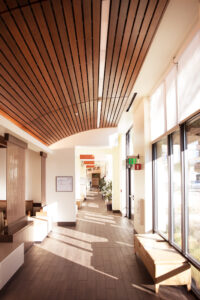 http://9Wood%208200%20Linear%20Wood%20Wave%20in%20Cherry%20Veneer%20features%20linear%20lighting%20integration.