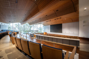 http://9Wood's%208100%20Wave%20Grille%20in%20Solid%20Western%20Hemlock%20with%20a%20Fir%20Stain%20in%20a%20University%20Seminar%20clasroom.