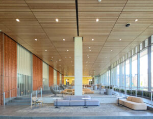 http://The%209Wood%20Continuous%20Linear%20Ceiling%20and%20Wall%20in%20White%20Maple%20Veneer%20in%20a%20University%20setting.