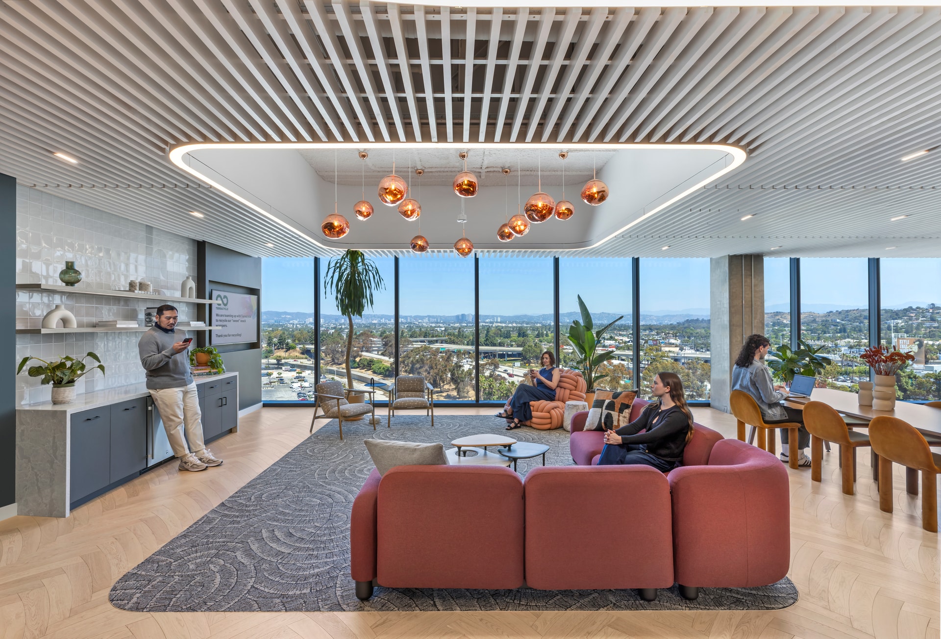 9Wood's 1100 Cross Piece Grille in Solid Western Hemlock and a White Opaque finish in a modern office setting.